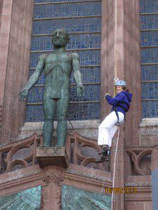 By statue